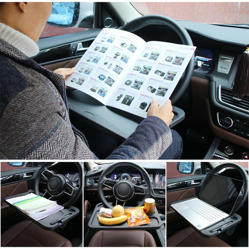 Car steering wheel tray with a tablet on the driver-side console