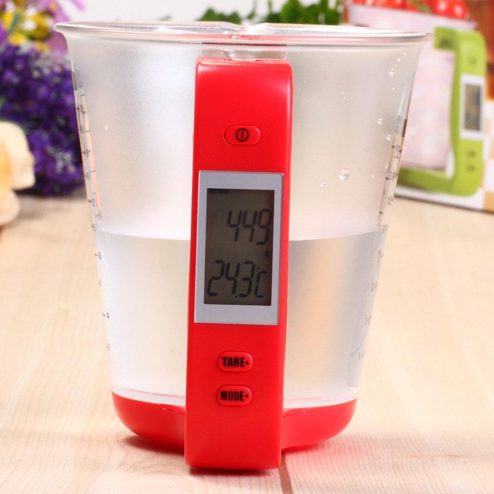 Red digital LCD measuring cup scale with clear cup and LCD reading