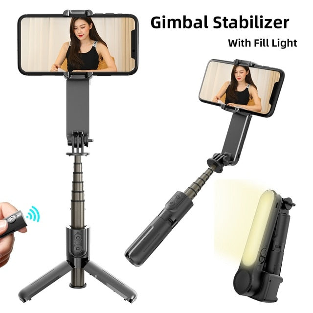 Phone gimbal stabilizer with LED fill light, tripod legs, and handheld grip