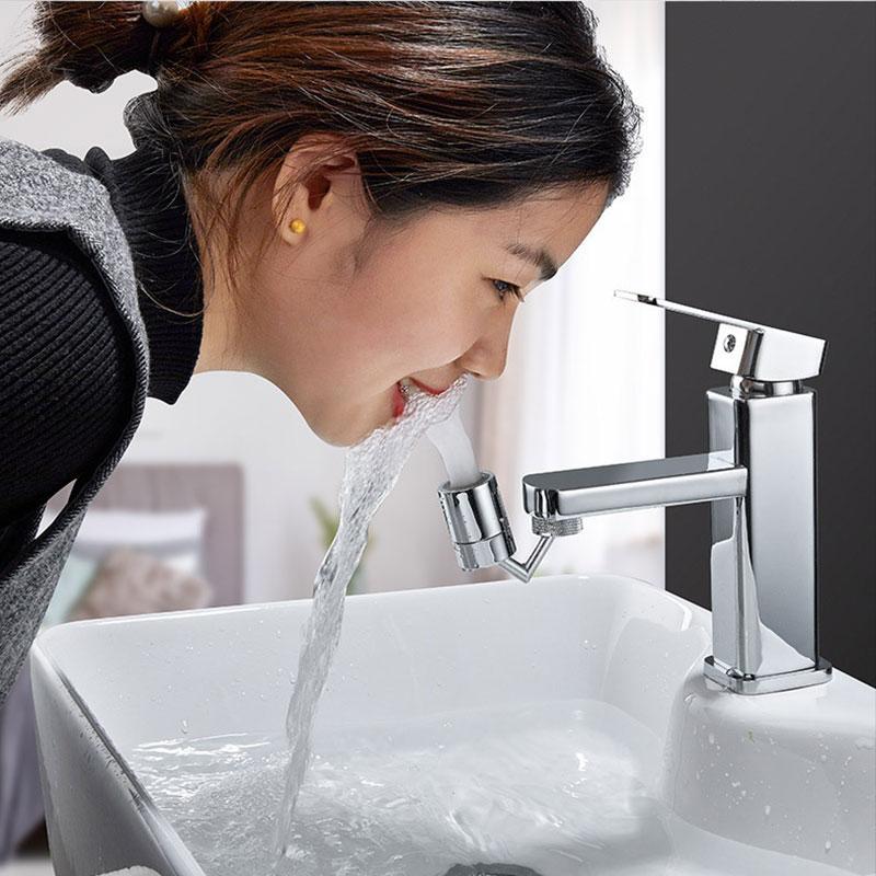 Faucet splash guard filter attachment with steady water stream over a white sink