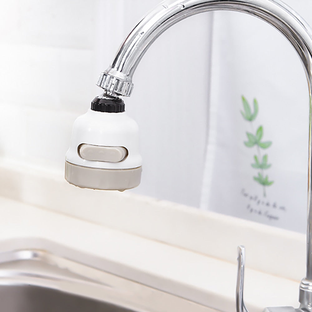 White faucet aerator installed on curved faucet spout