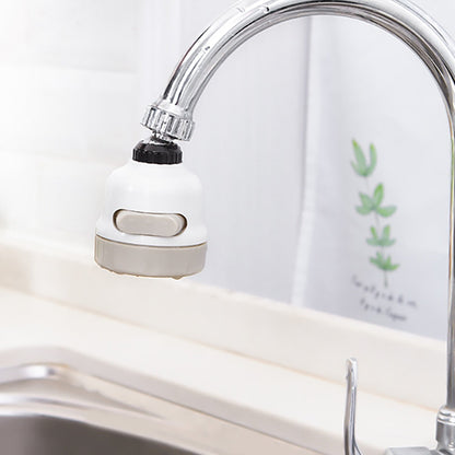White faucet aerator installed on curved faucet spout