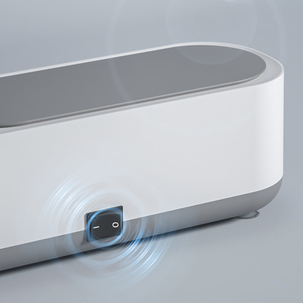 Ultrasonic cleaner machine with front control area and blue power indicator