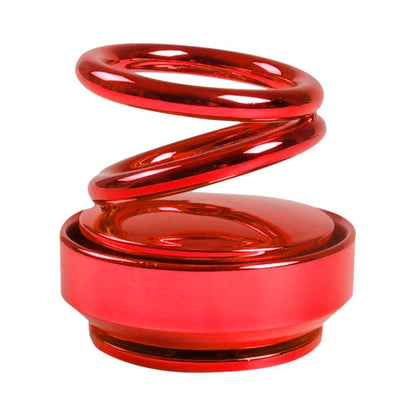 Red double-ring car air freshener with swirling top in a round, glossy base