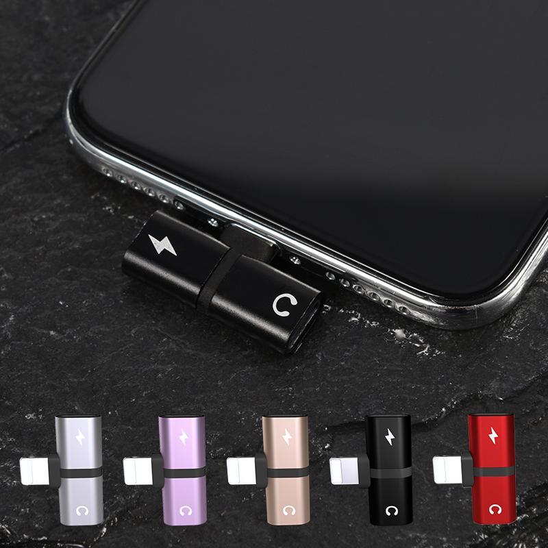 2-in-1 audio and charging adapter attached to phone bottom, black USB-C connector