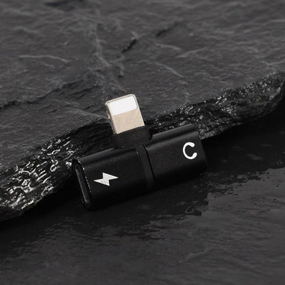 2-in-1 audio and charging adapter, black body with USB-C plug and audio output