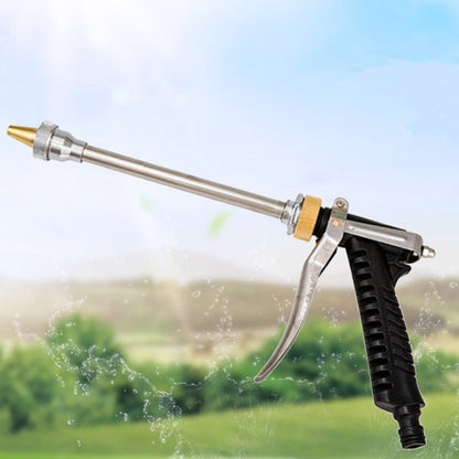 High-pressure car wash spray gun releasing a fine spray from the brass nozzle