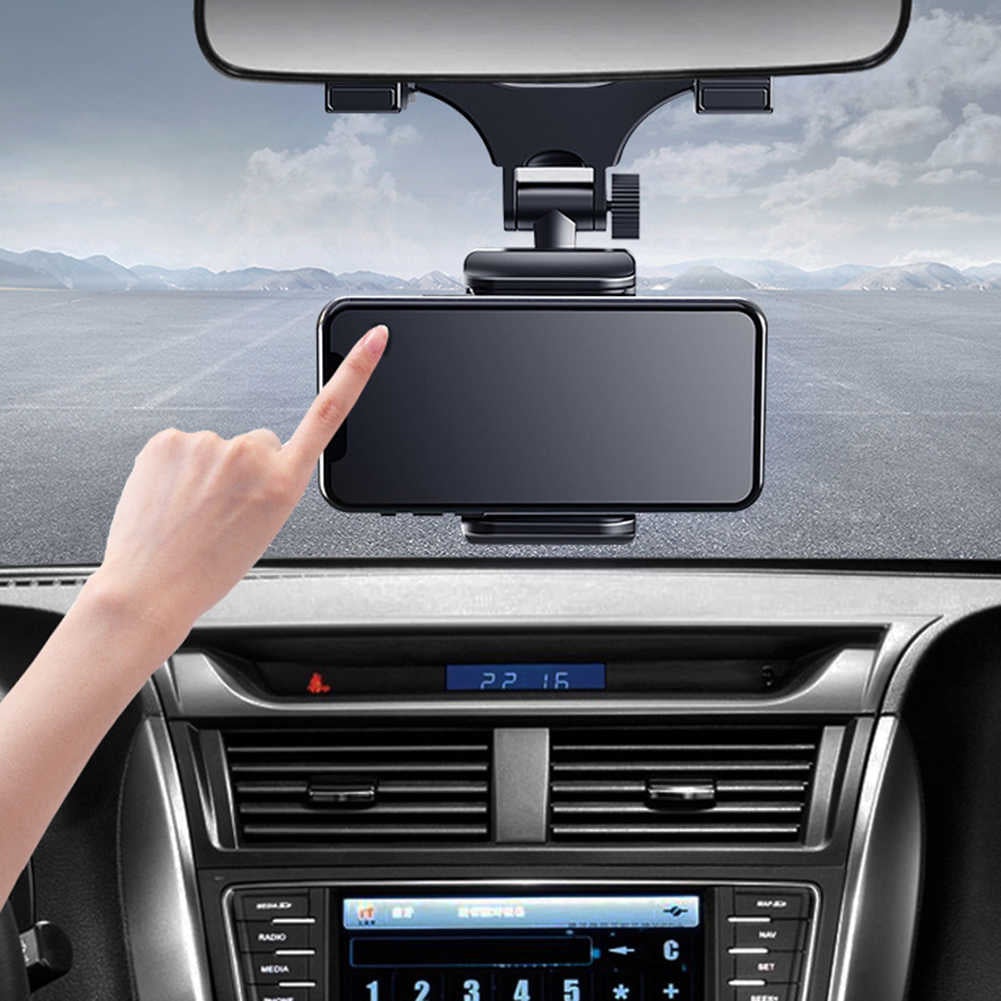 Black mirror phone holder gripping a smartphone in portrait orientation