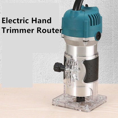 Electric hand trimmer router with teal motor, transparent base on wood