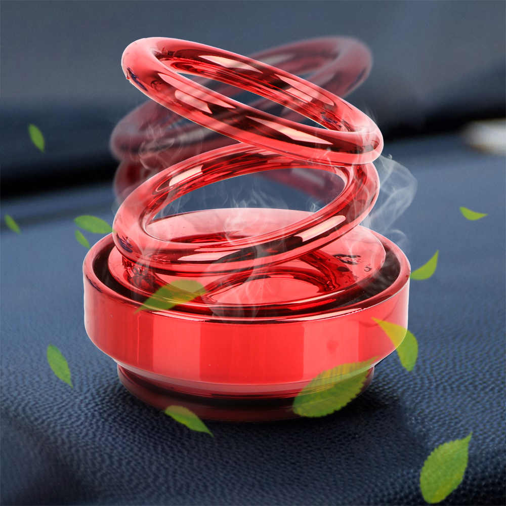 Red double-ring car air freshener with swirling top and glossy base
