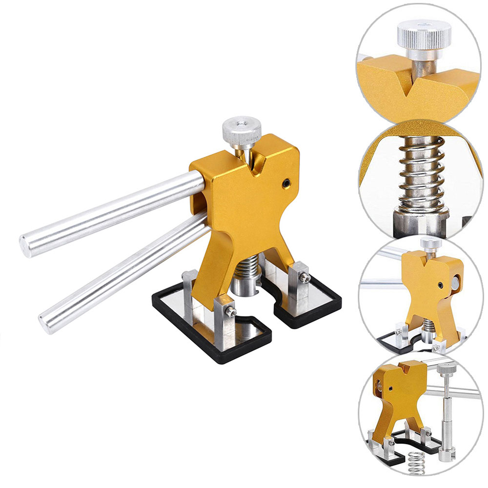 Gold paintless dent repair tool with two rods, spring plunger, and black base blocks
