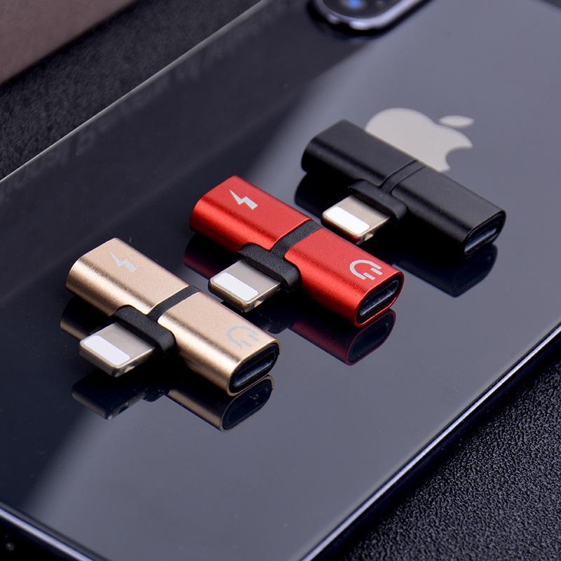 2-in-1 audio and charging adapters, red and black with USB-C plugs and audio ports