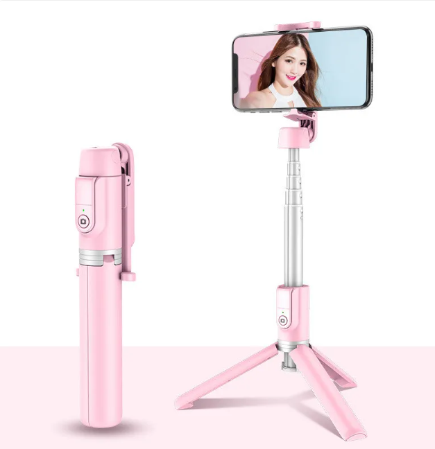 Pink Bluetooth selfie stick tripod with phone holder and foldable legs