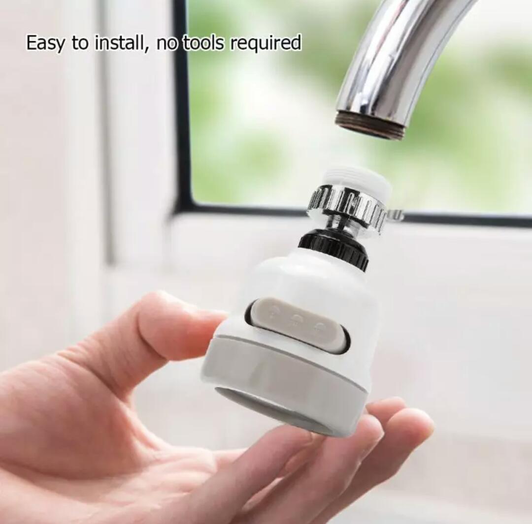 White 3-mode faucet aerator held in hand with mode button and chrome connection