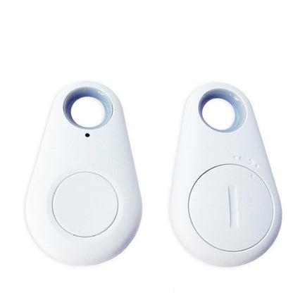 White Bluetooth tracker tags, each with lanyard hole and round button.
